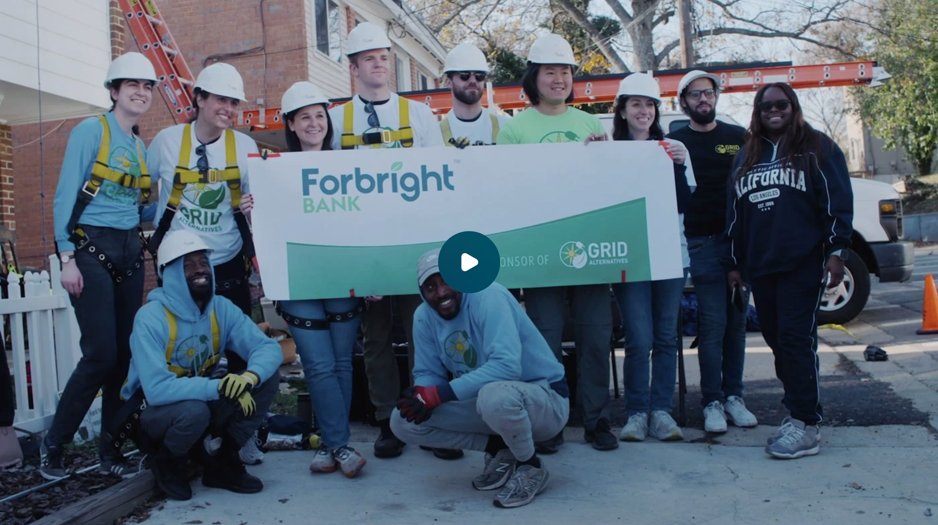 A group of team members volunteering at an event. 